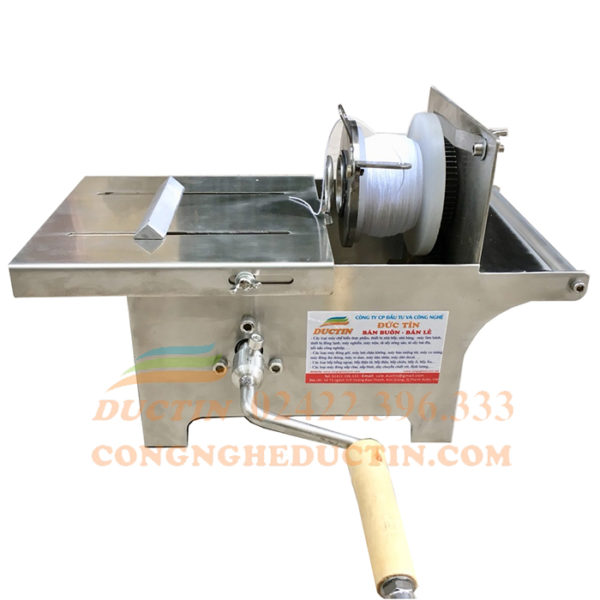 May-buoc-xuc-xich-quay-tay May-buoc-xuc-xich-quay-tay